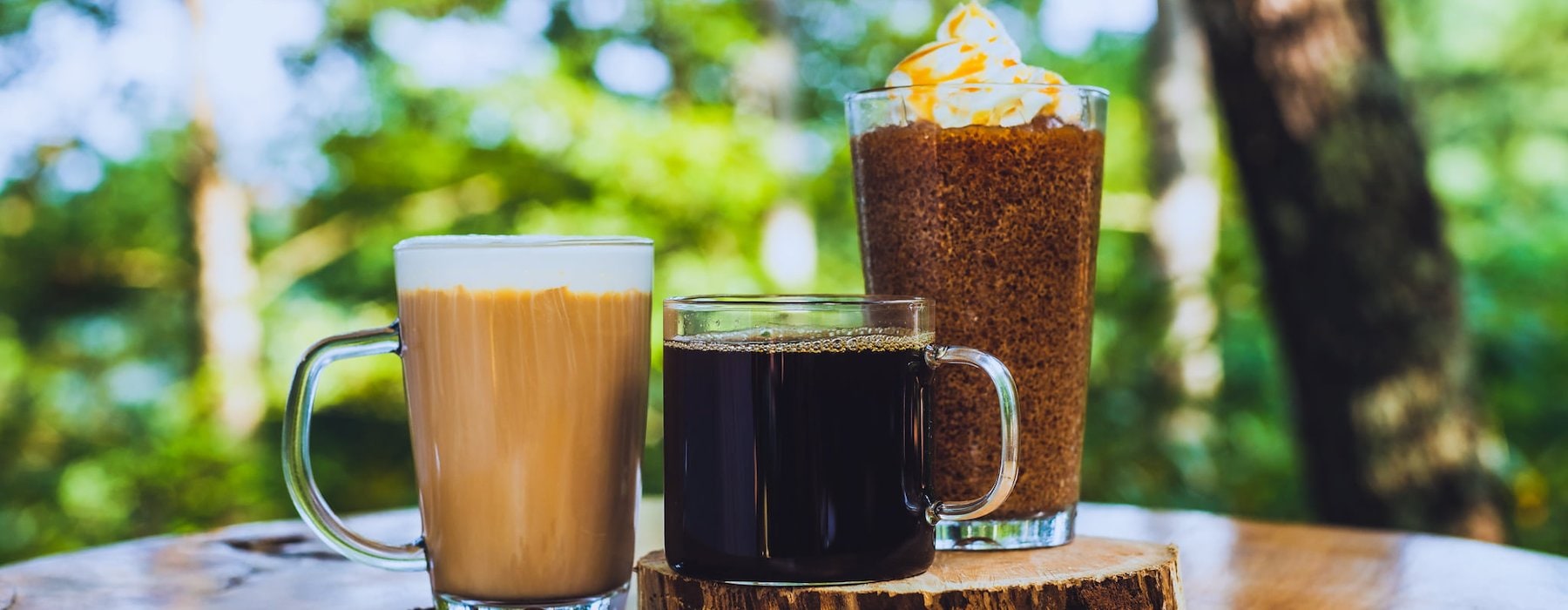 Coffee drinks are on a wooden table outdoors Adventures on the Gorge - Lansing West Virginia USA