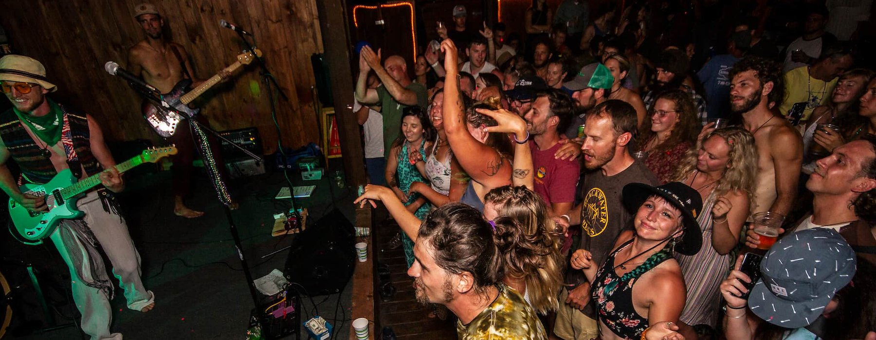 Lively crowd enjoys a band performing on stage Adventures on the Gorge - Lansing West Virginia USA