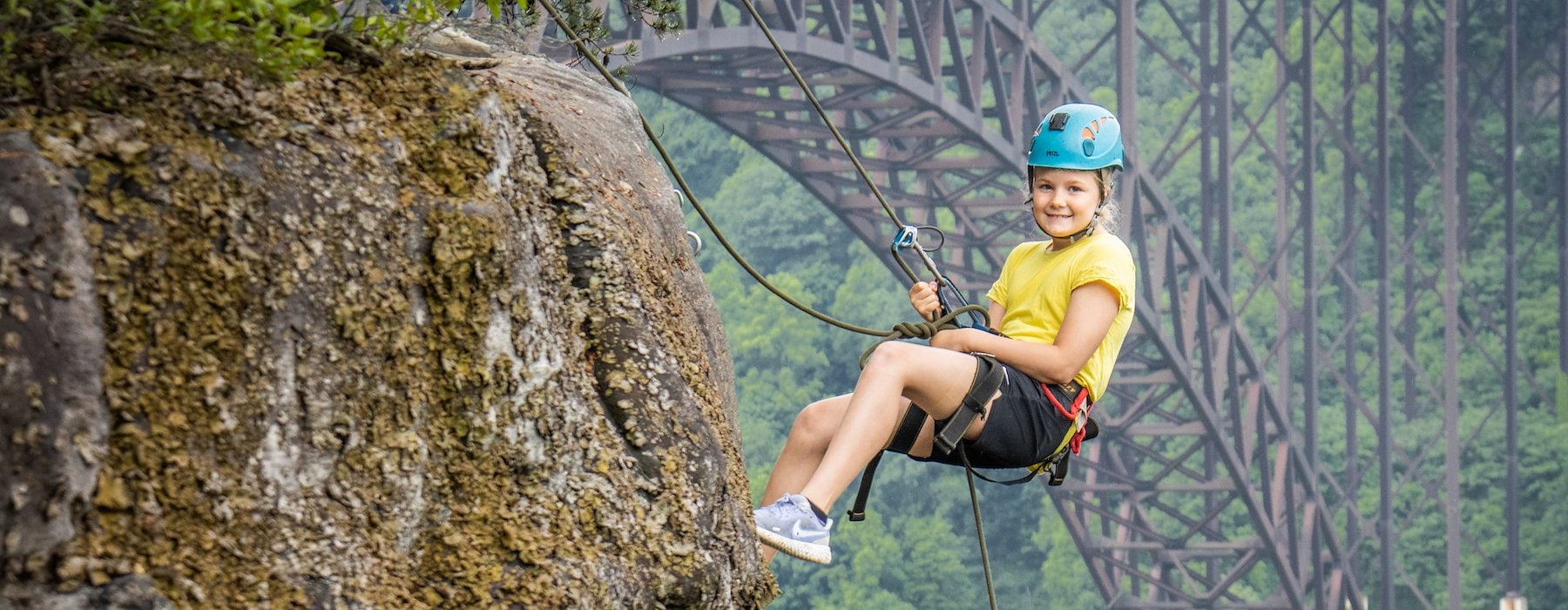 Rappels down a rocky cliff Adventures on the Gorge - Lansing West Virginia USA