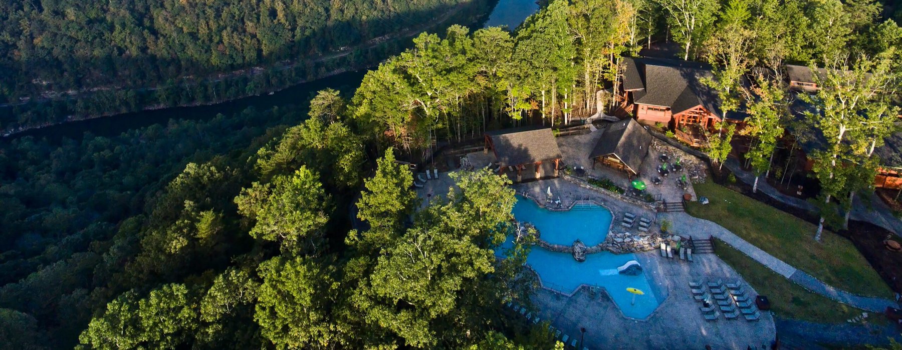 Aerial view of a resort nestled beside a winding river Adventures on the Gorge - Lansing West Virginia USA