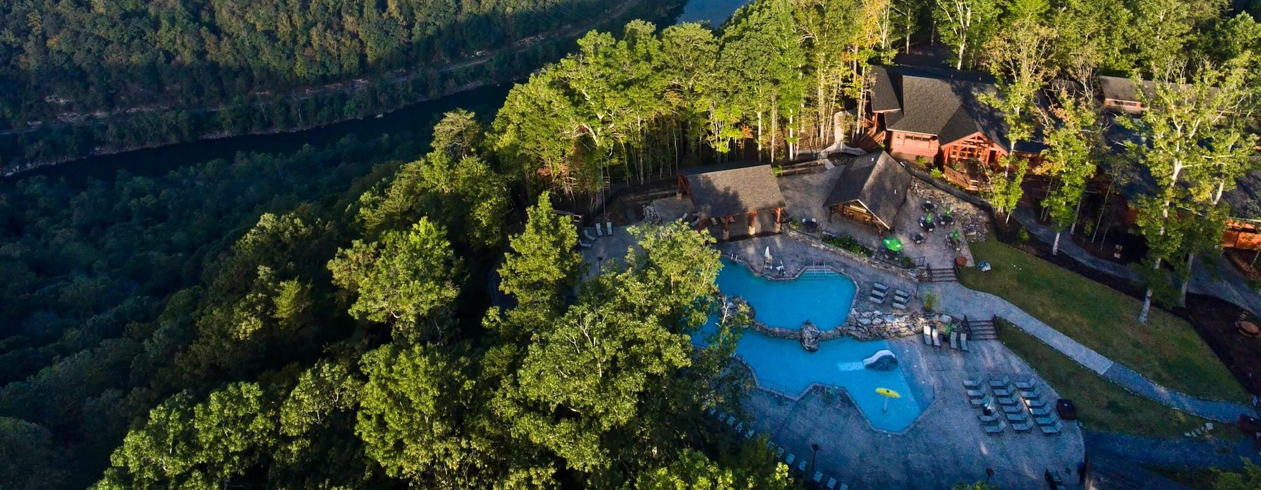 Aerial view of a resort nestled beside a winding river Adventures on the Gorge - Lansing West Virginia USA