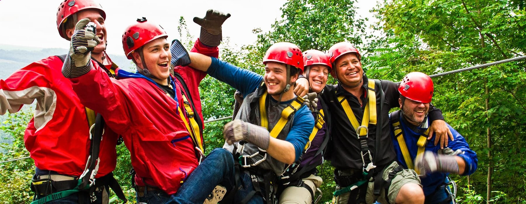 A Family Enjoying A Thrilling Zipline Experience at Adventures on the Gorge - Lansing West Virginia USA