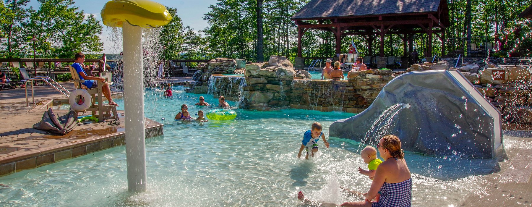 A Family Having Fun At A Resort Water Park at Adventures on the Gorge - Lansing West Virginia USA