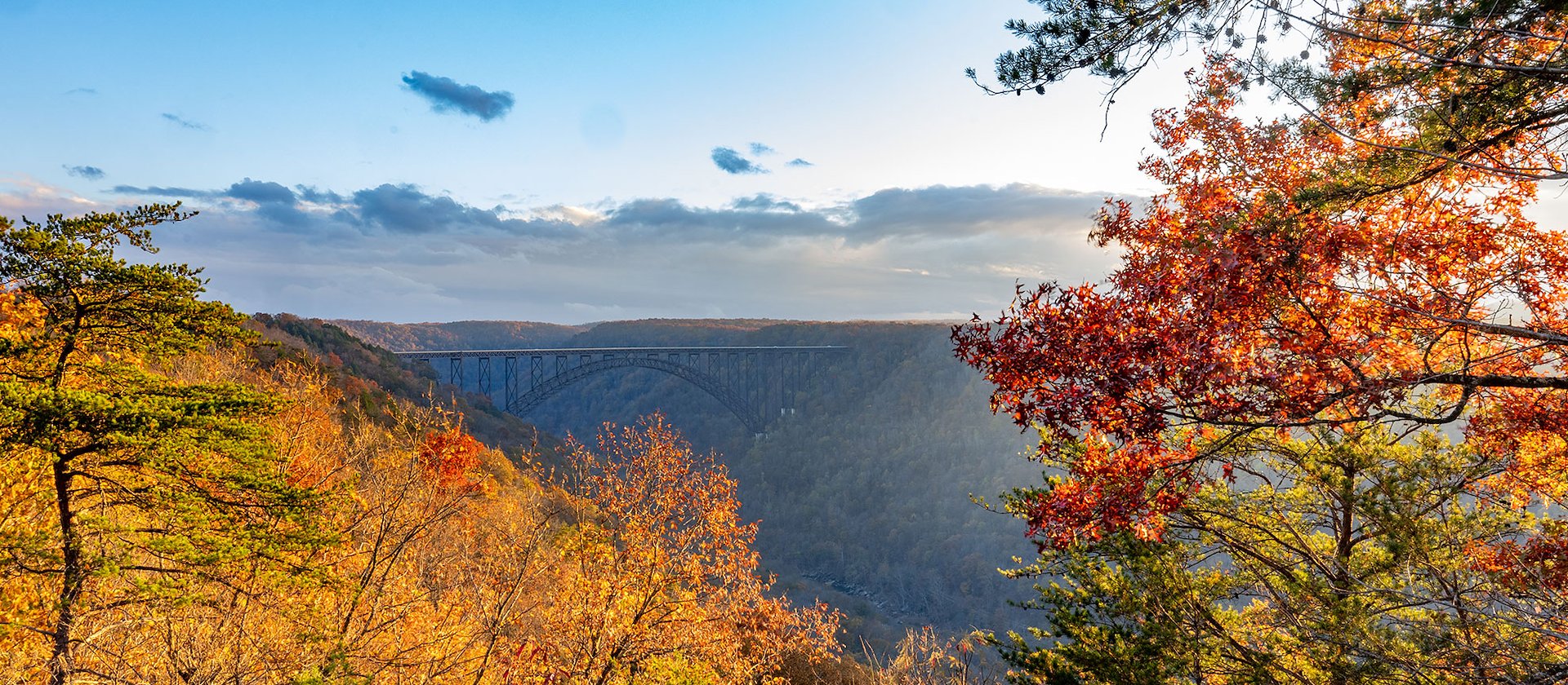 Overlooking the New River Gorge Bridge with fall leaves at Adventures on the Gorge