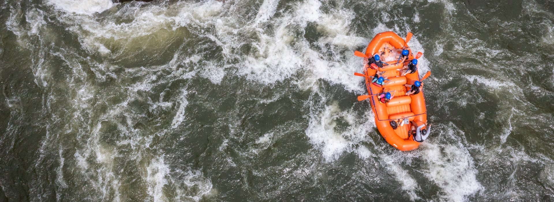 Aerial view of a group white-water rafting in a turbulent river Adventures on the Gorge - Lansing West Virginia USA