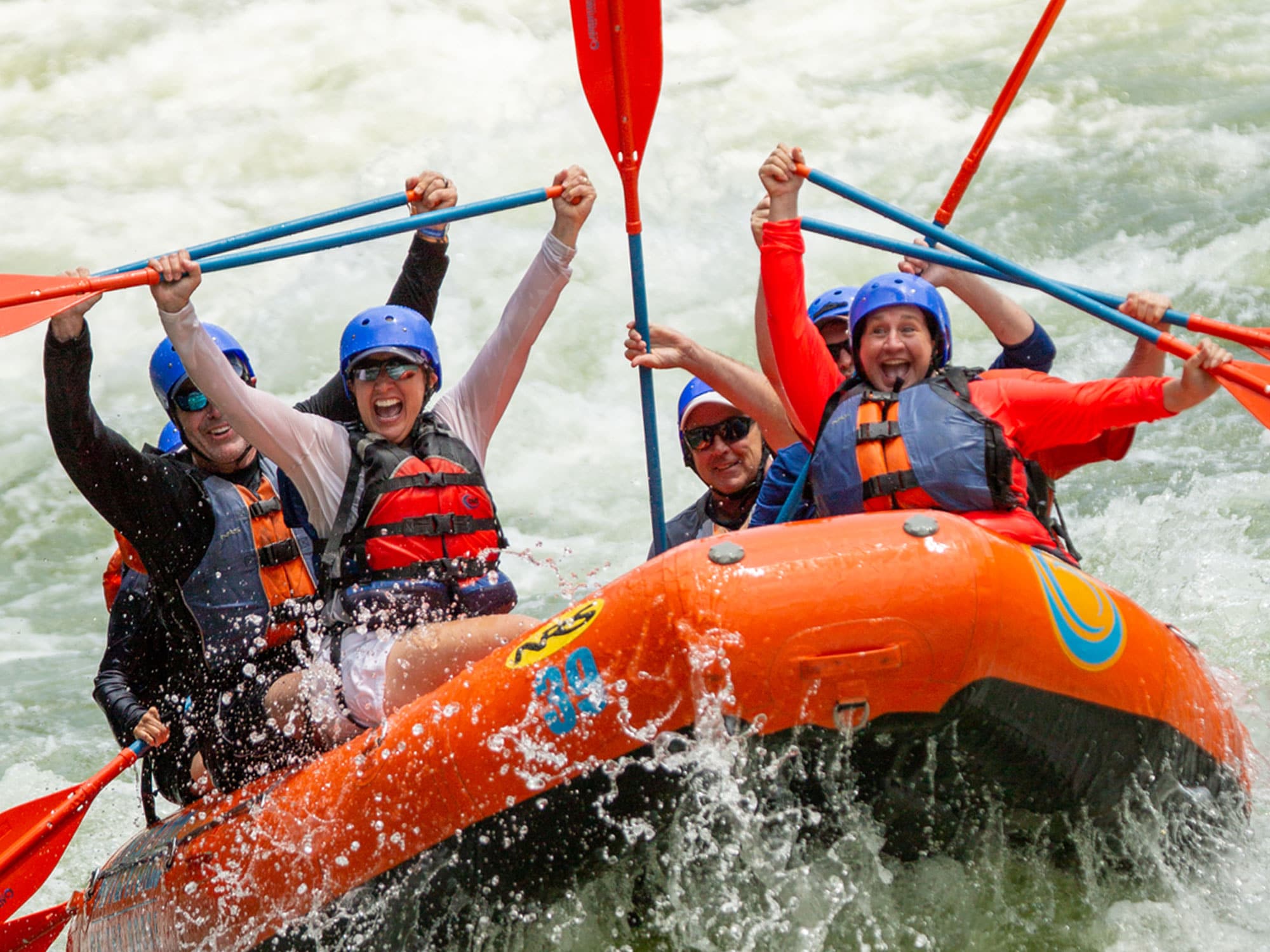 A group of people in a raft