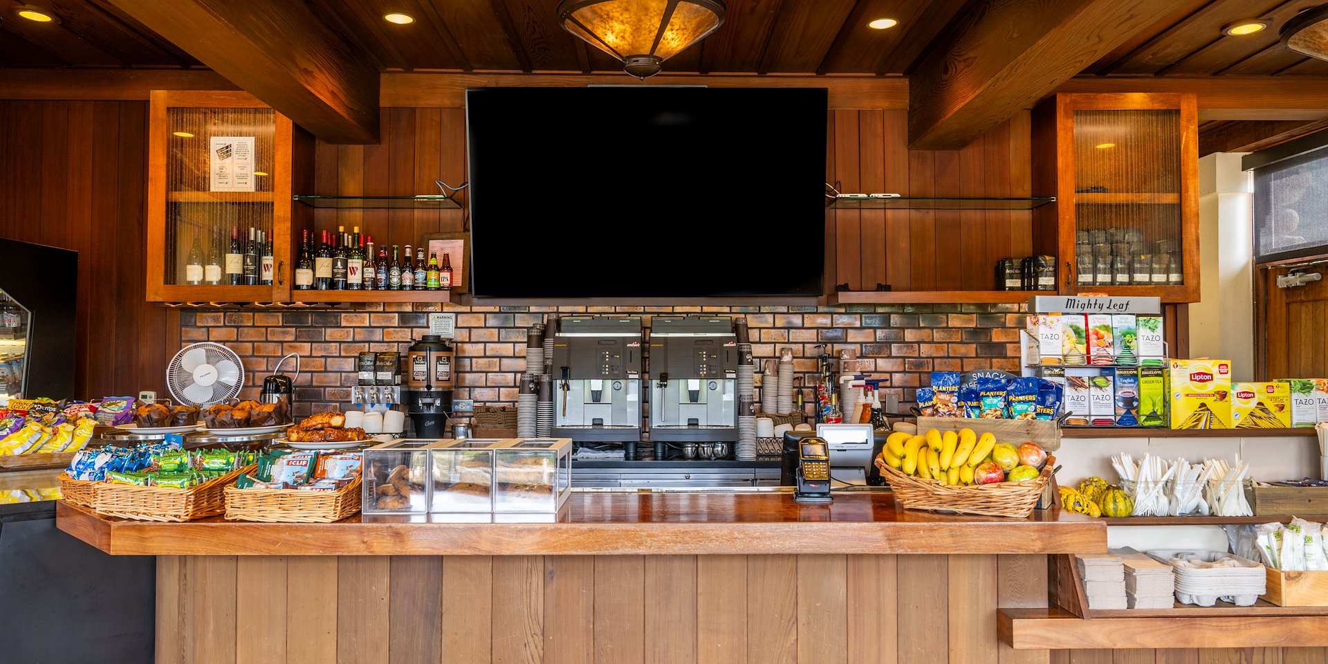 A cozy café counter with wooden panels displaying various snacks Asilomar Hotel and Conference Grounds - Pacific Grove California