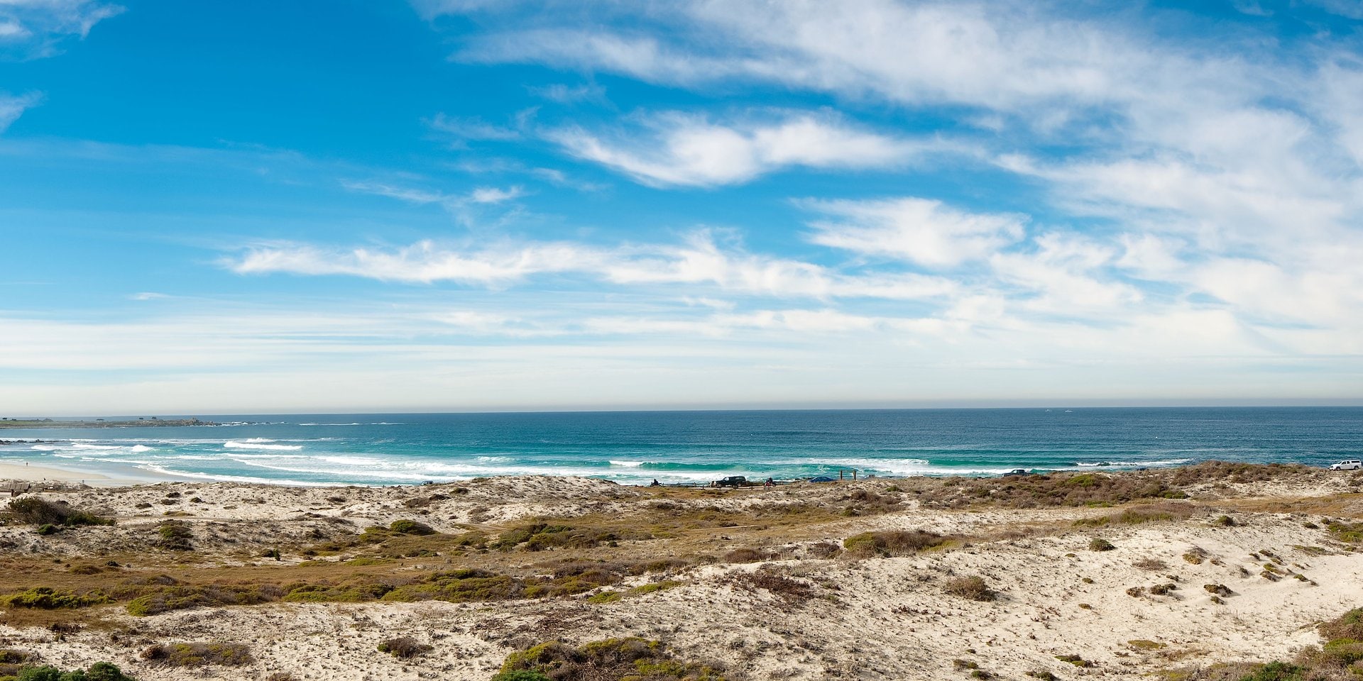 A serene beach landscape with gentle waves lapping at the shore Asilomar Hotel and Conference Grounds - Pacific Grove California