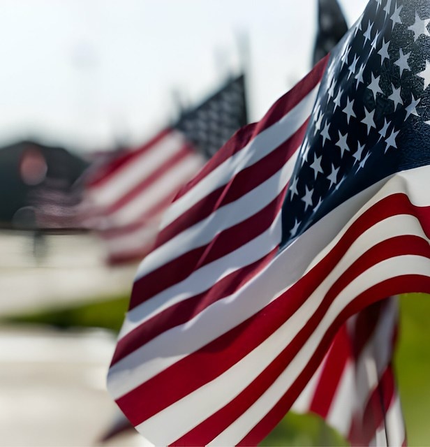 Asilomar Hotel and Conference Grounds Pacific Grove California - Close-up of multiple American flags waving in the wind