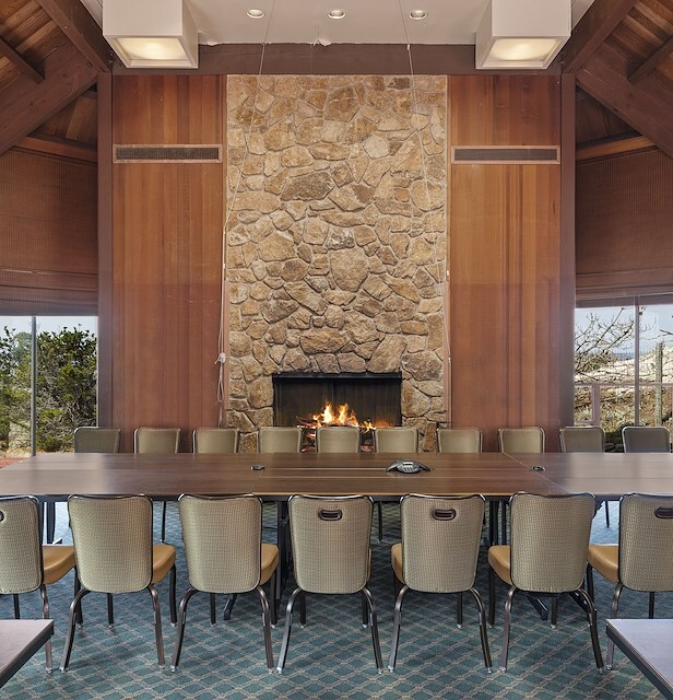 Conference room with a long table facing a stone fireplace Asilomar Hotel and Conference Grounds - Pacific Grove California