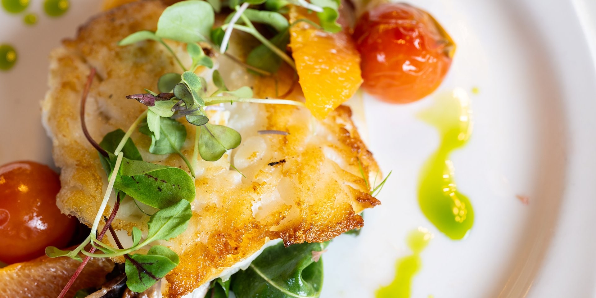 Grilled fish topped with fresh microgreens Asilomar Hotel and Conference Grounds - Pacific Grove California