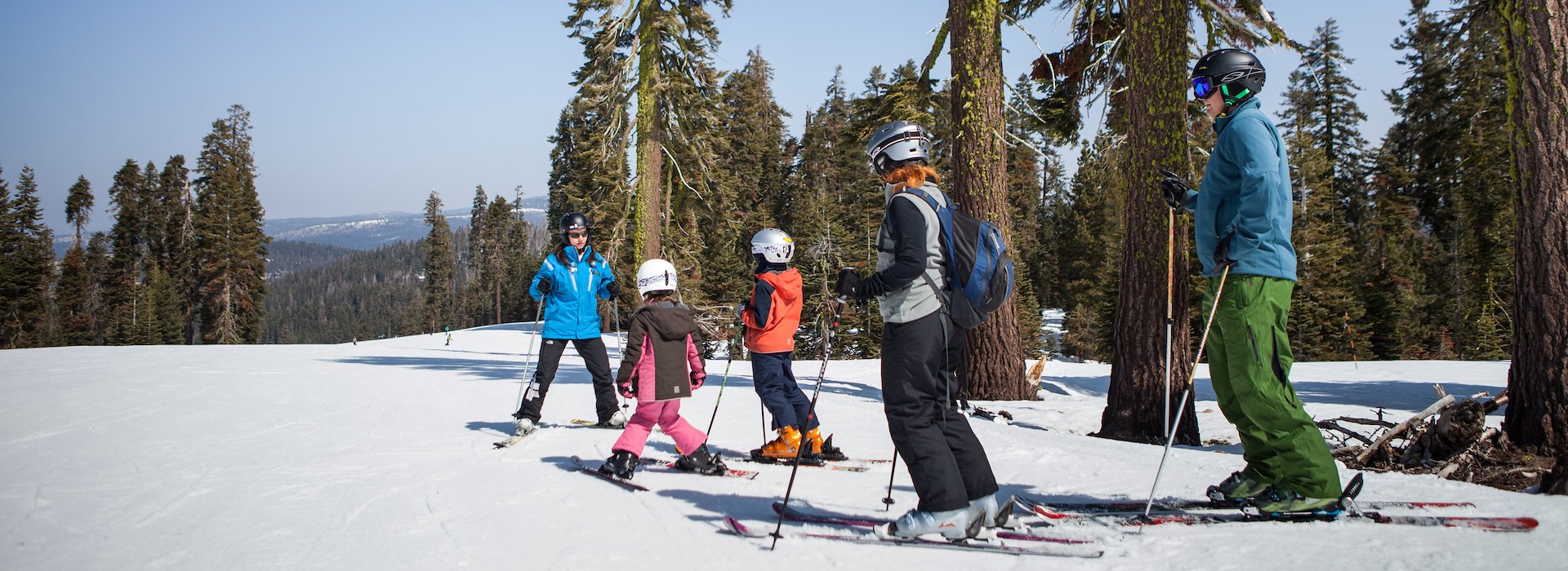 A collective of people skiing down a mountain Yosemite National Park Lodging and Activities - California - United States