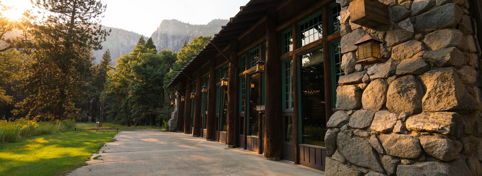 Yosemite National Park Lodging and Activities California United States - A modern building with windows reflecting its surroundings