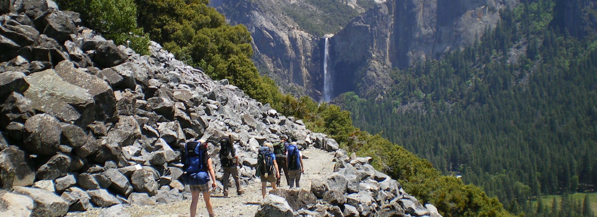 A challenging rocky trail set against a backdrop of nature Yosemite National Park Lodging and Activities - California - United States