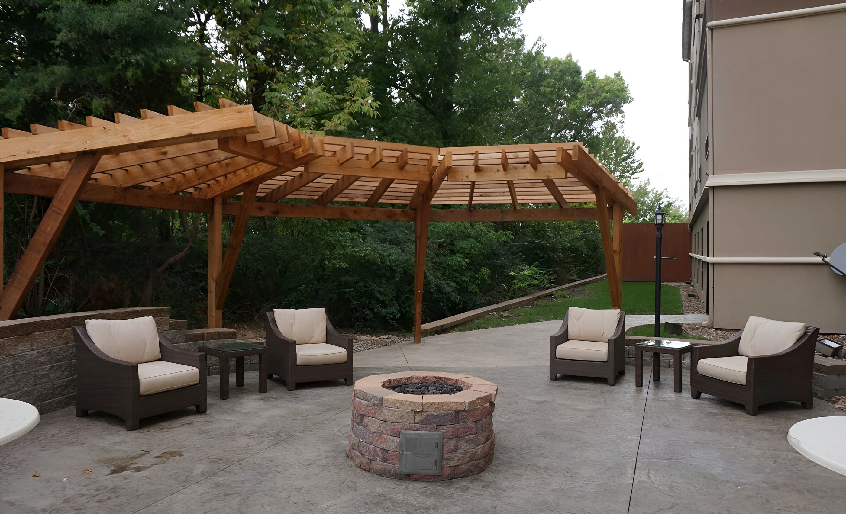 Cozy outdoor seating area at Staybridge Suites Columbia, Missouri.