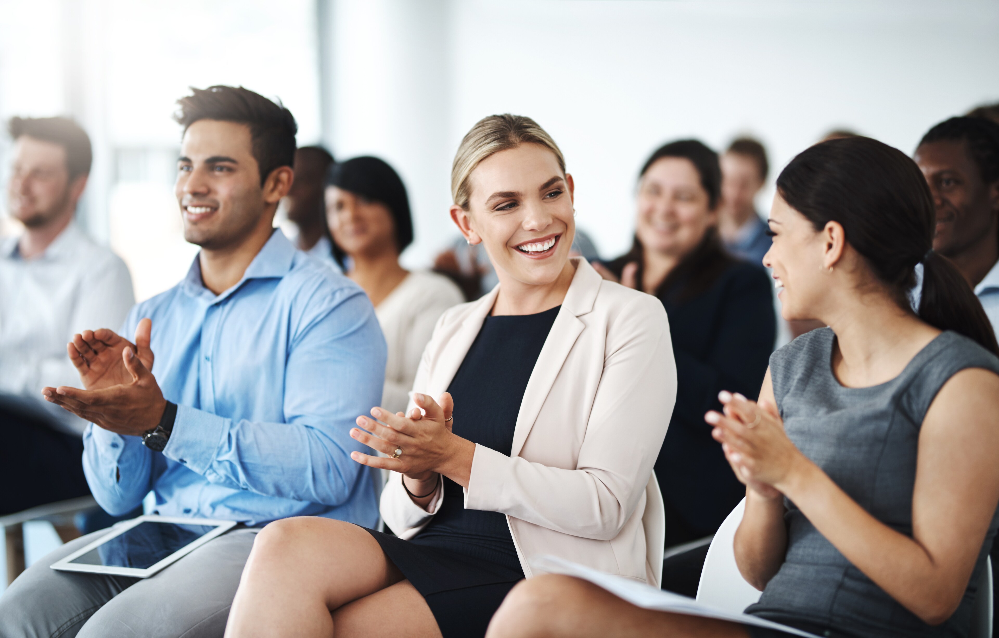 Attendees applaud during a conference at Wingate by Wyndham in Columbia, Missouri.