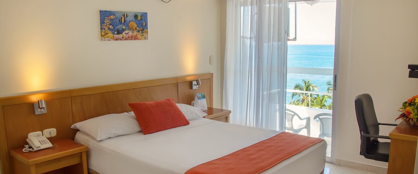 Habitación con cama king y vista al mar, be La Sierra