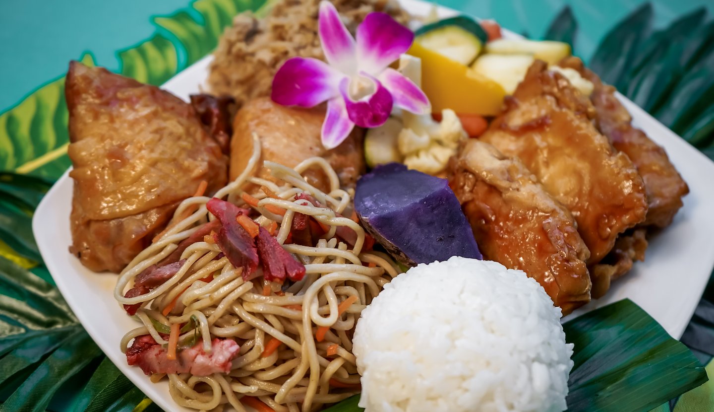 Plate close up of Menu in Chiefs Luau in Roberts Hawaii, Honolulu, HI, USA