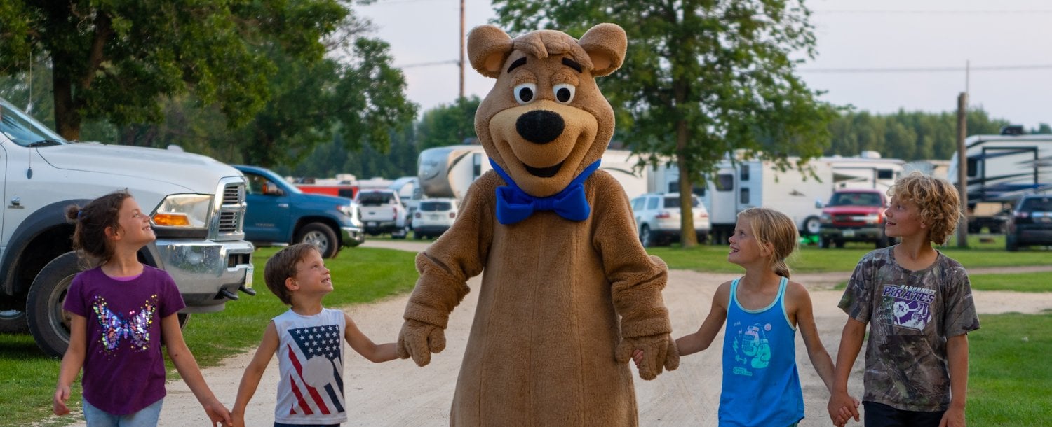 Boo Boo™ with Children at Jellystone Park™ Monticello
