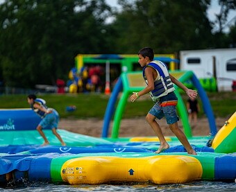 Floating Obstacle Course Wristbands at Jellystone Park™ Monticello