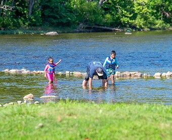 Family in the river