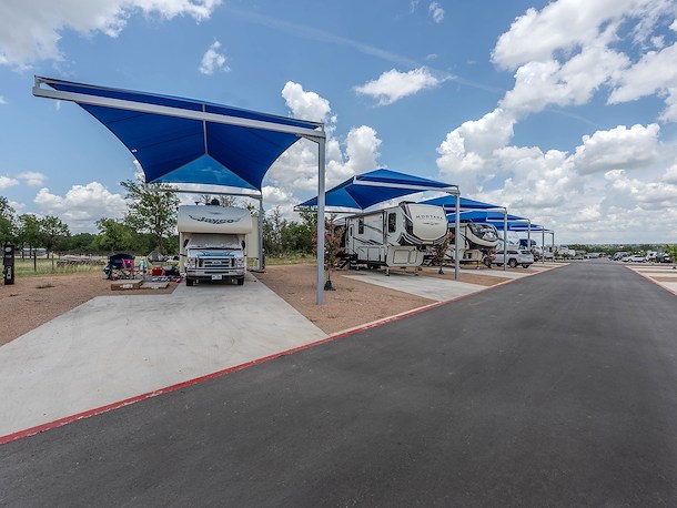 Beat the heat with a covered back-In RV site at Jellystone Austin North in Georgetown, Texas - 2