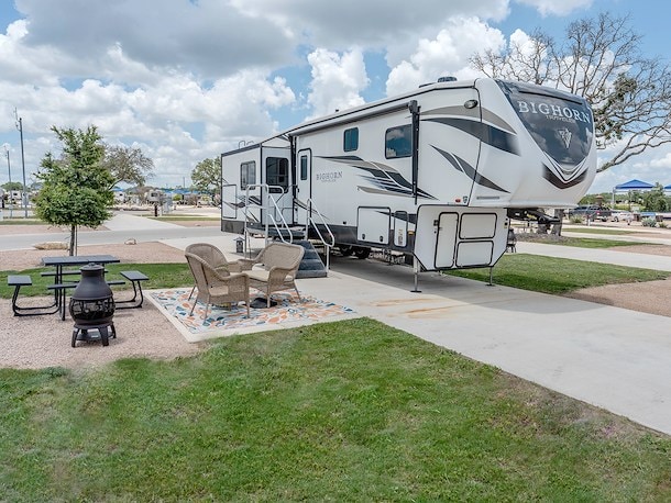 Super spacious and convenient pull-thru RV sites at Jellystone Austin North in Georgetown, Texas. - 1