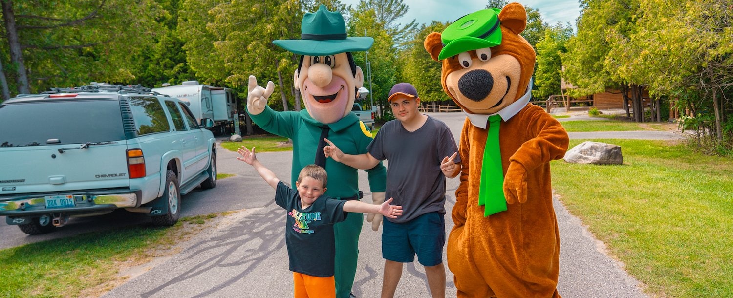 Yogi Bear™ and Ranger Smith™ with Family at Jellystone Park™ Petoskey