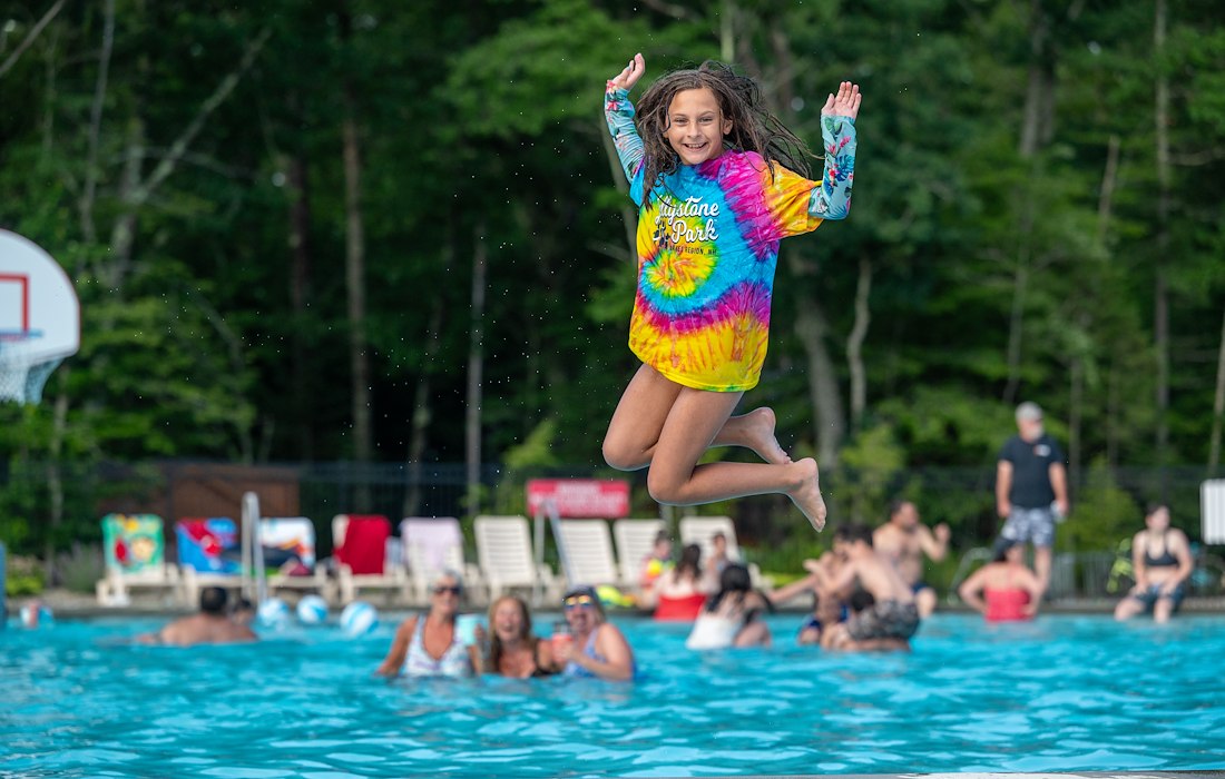 Expansive pool area for families in Jellystone Park™ Lakes Region