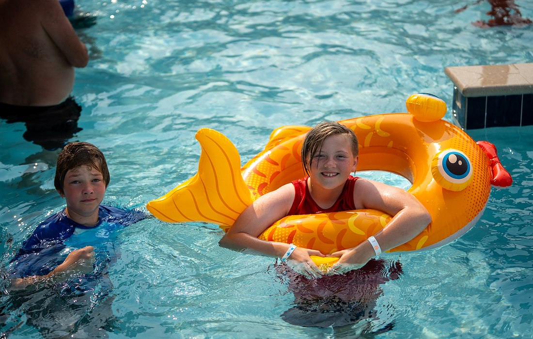 Swim, splash, and do water handstands! at Jellystone Park™ Finger Lakes