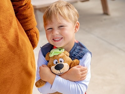 Themed accessories for attending children (pirate patch and sword, plush bear)