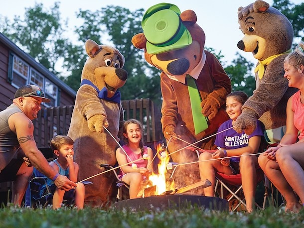 Campfire with family at Jellystone Park Caledonia