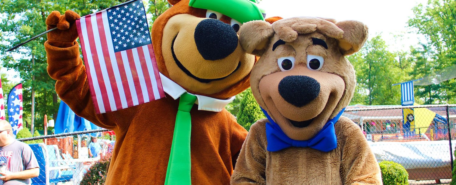 Jellystone Park™ Pigeon Forge, Yogi bear holding a flag