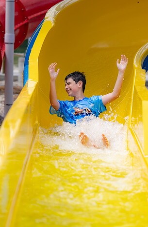 Exciting Adventures on Our Water Slides! at Jellystone Park™ Natural Bridge
