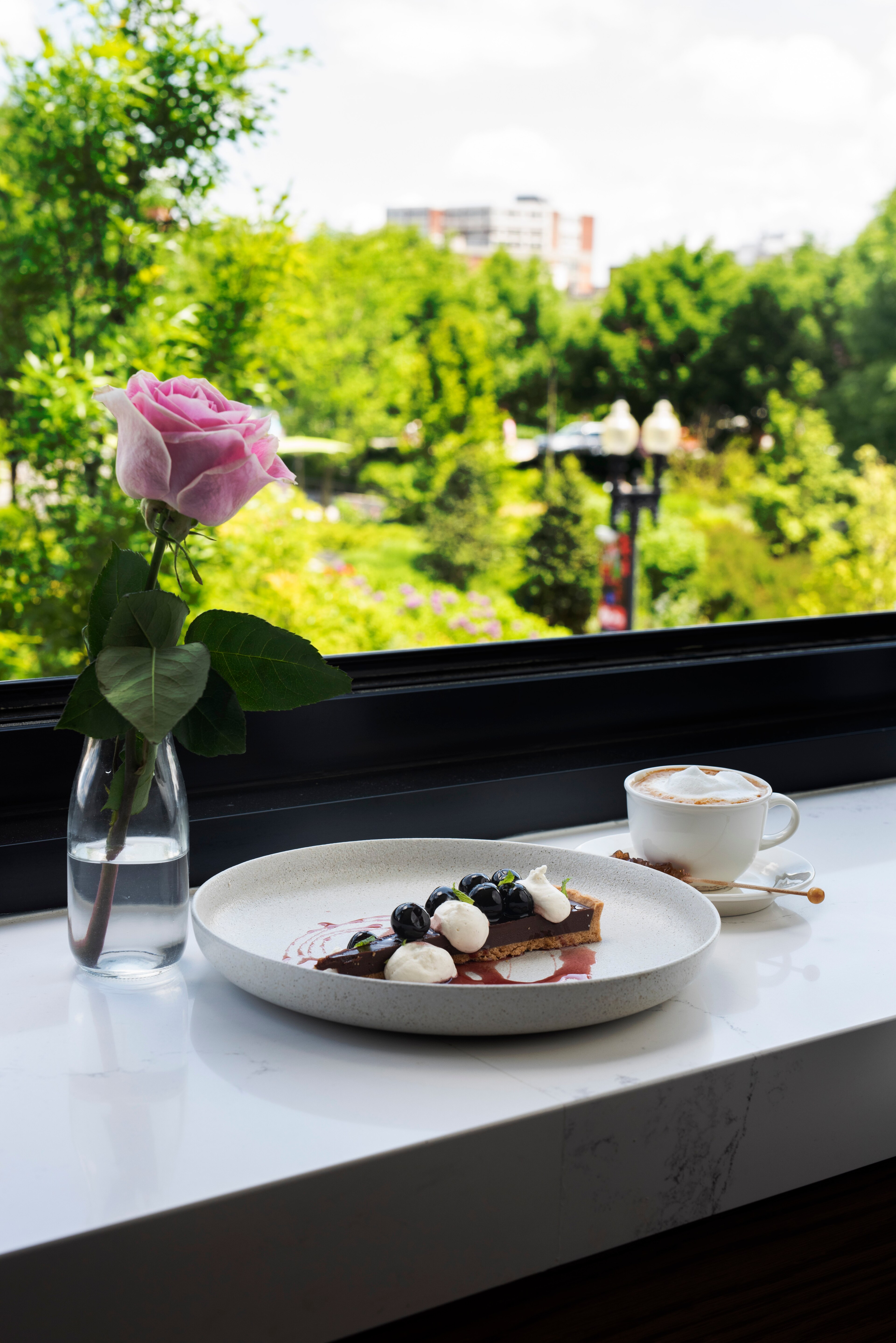 Dessert served with coffee at ROSE Town Kitchen & Bar, Boston Downtown