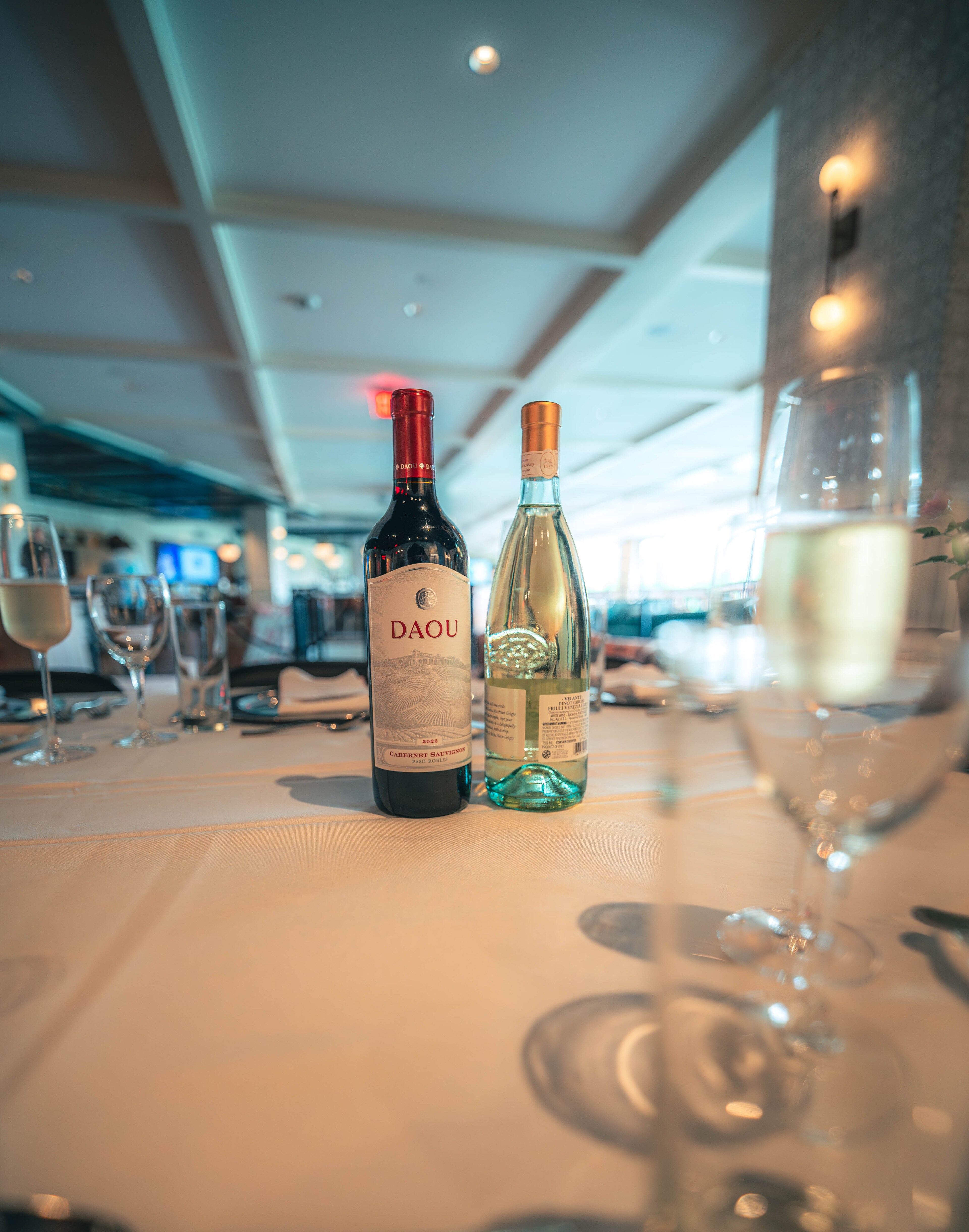 Rose wine bottles on table at Canopy by Hilton Boston