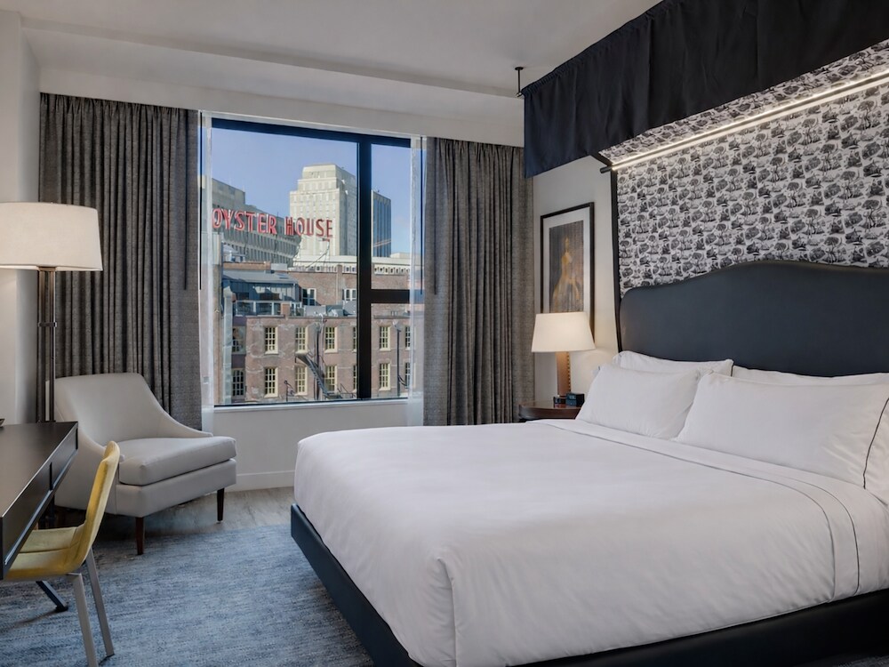 Cozy room at Canopy by Hilton Boston Downtown with a city view.