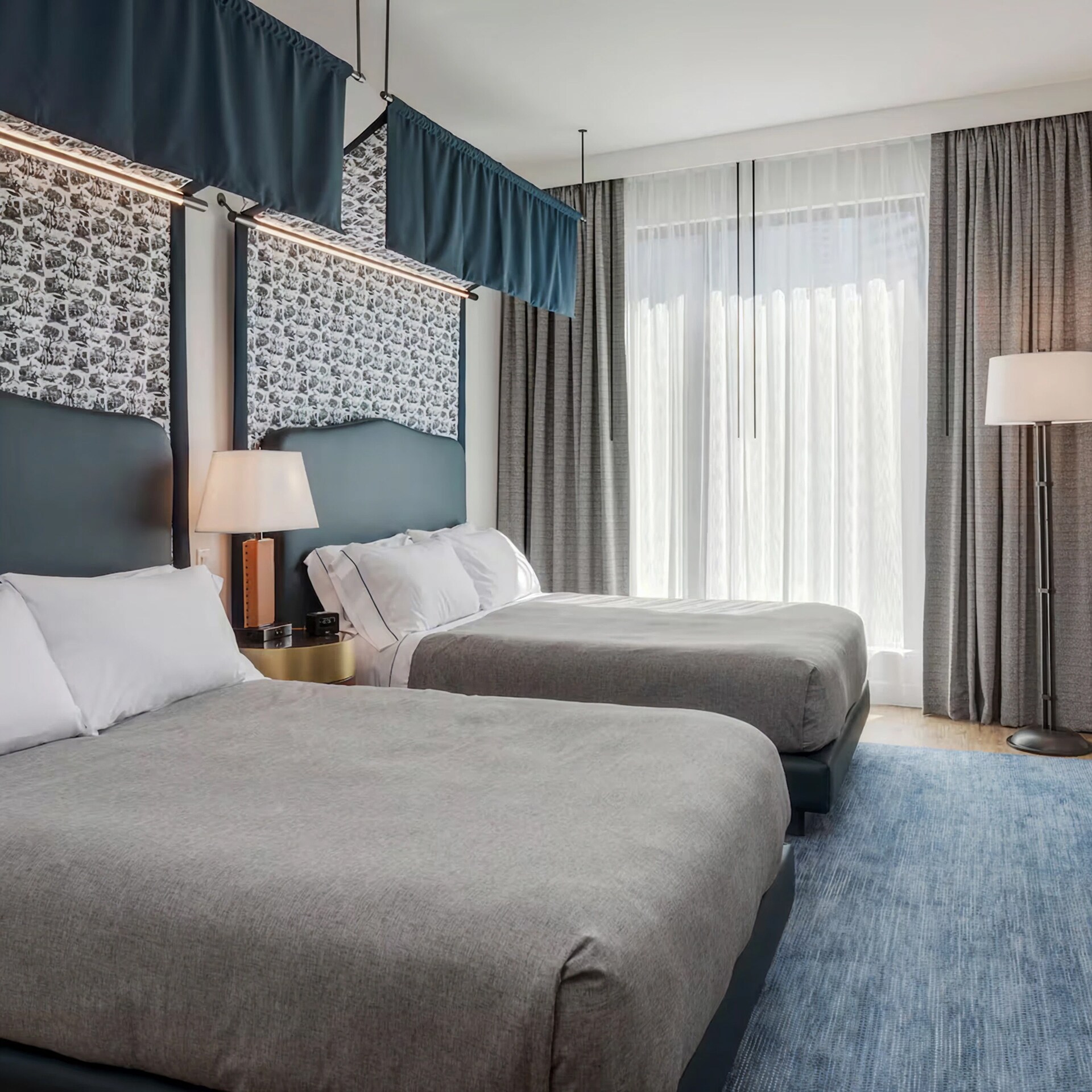 Guest room with two beds at Canopy by Hilton Boston Downtown, MA.