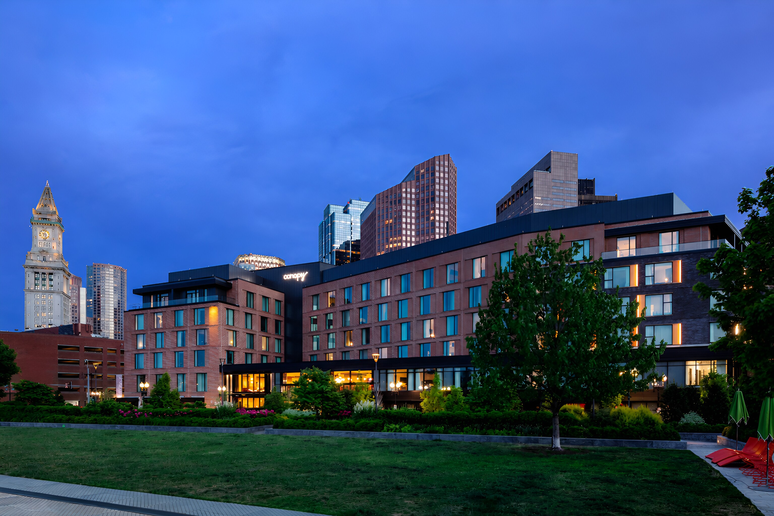 The Canopy by Hilton Boston Downtown stands amidst Boston's skyline.