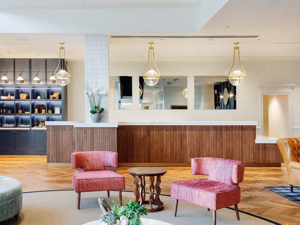 The lobby of Canopy by Hilton Boston Downtown features stylish seating.