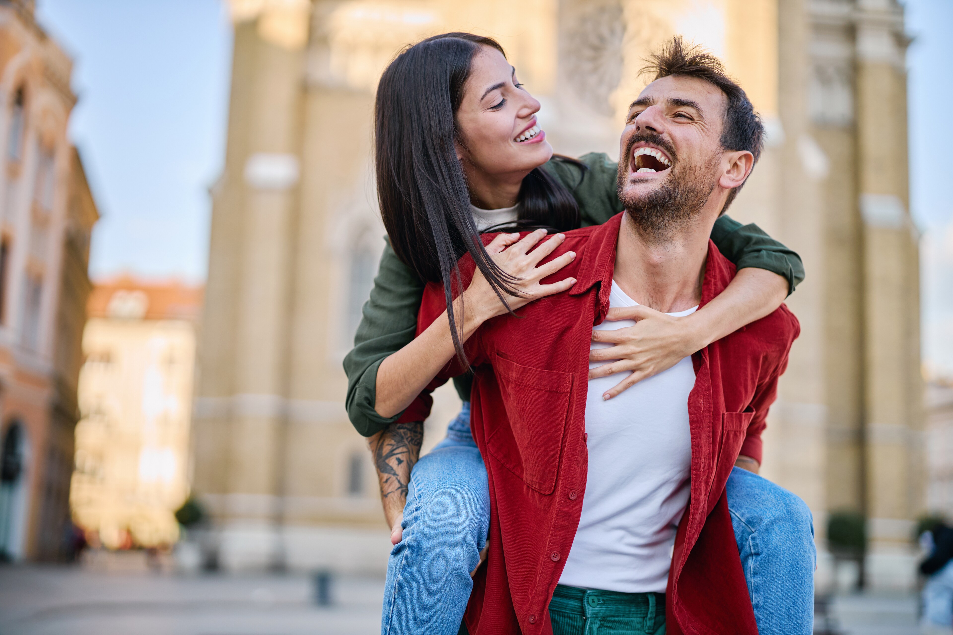 Couple sharing a playful piggyback ride