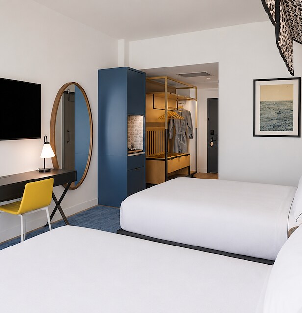 Guest room with two beds with city view at Canopy by Hilton Boston Downtown, MA. - 3