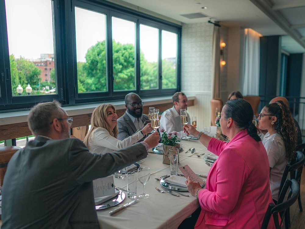 Cheers in ROSE Town Kitchen & Bar At Canopy by Hilton Boston Downtown