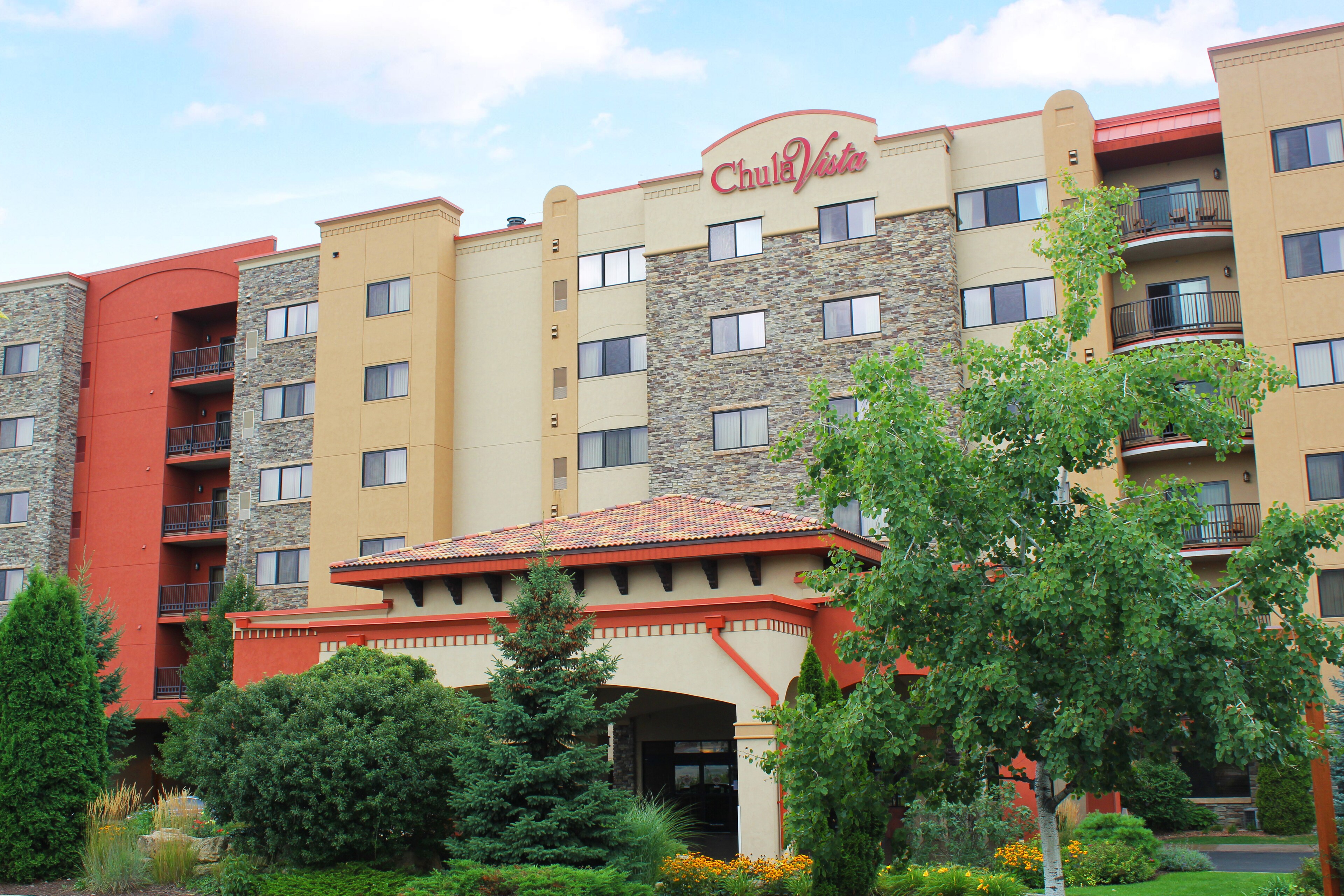 A building with trees and bushes