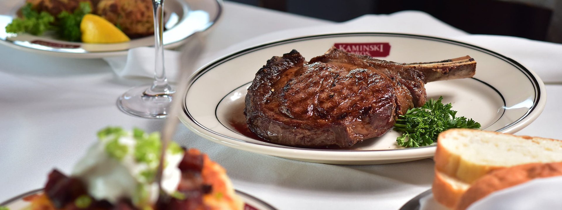 Ribeye steak with sides and red wine at Chula Vista Resort, Wisconsin Dells, Wisconsin
