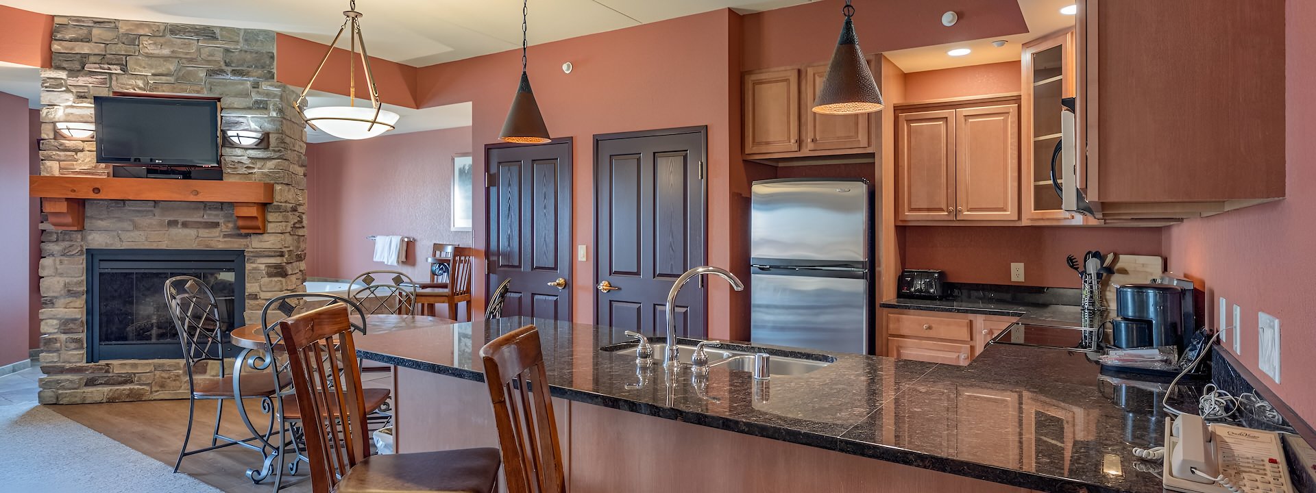A view of the living room and kitchen area of a hotel, Chula Vista Resort, Wisconsin Dells, Wisconsin