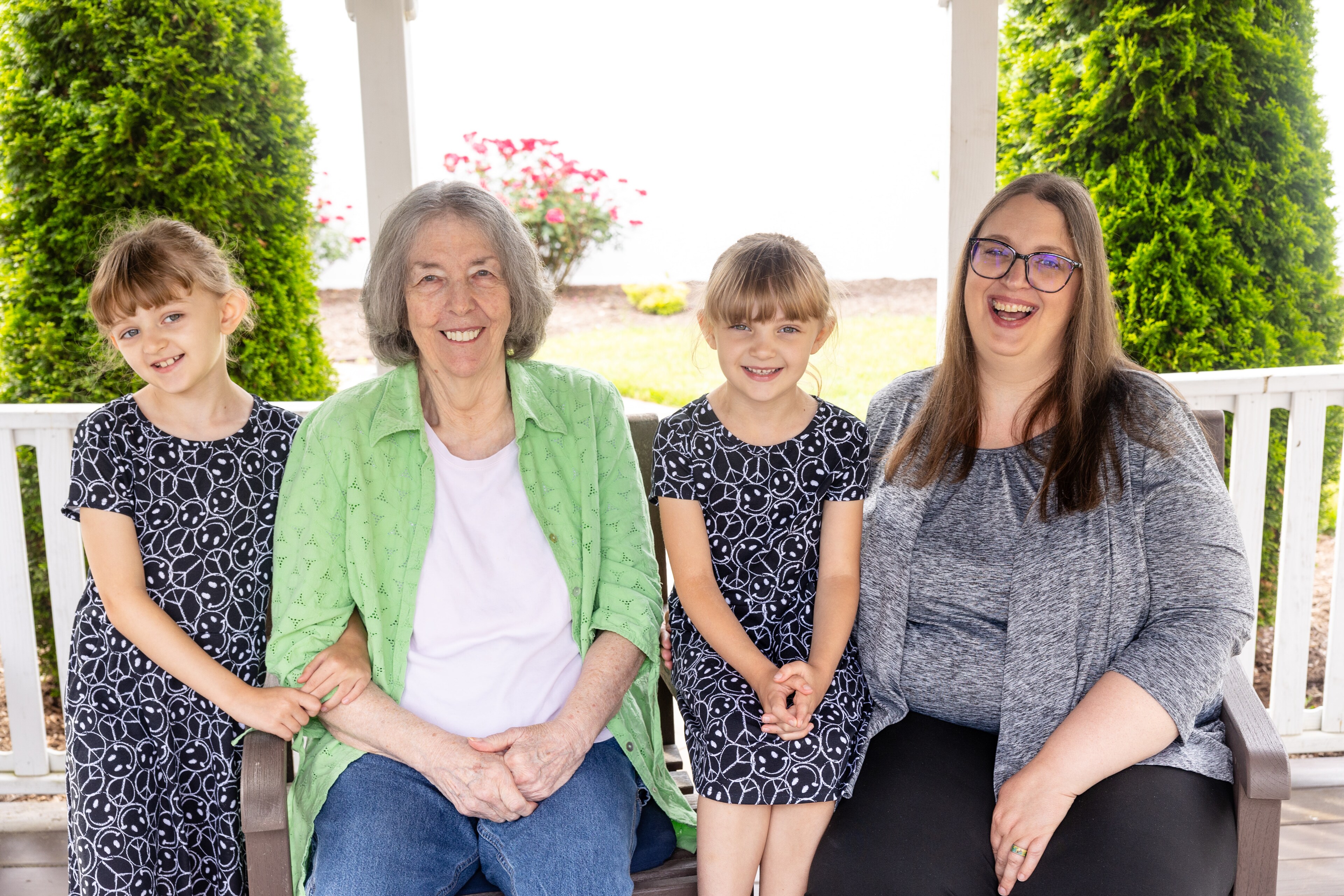 A family sitting together outside