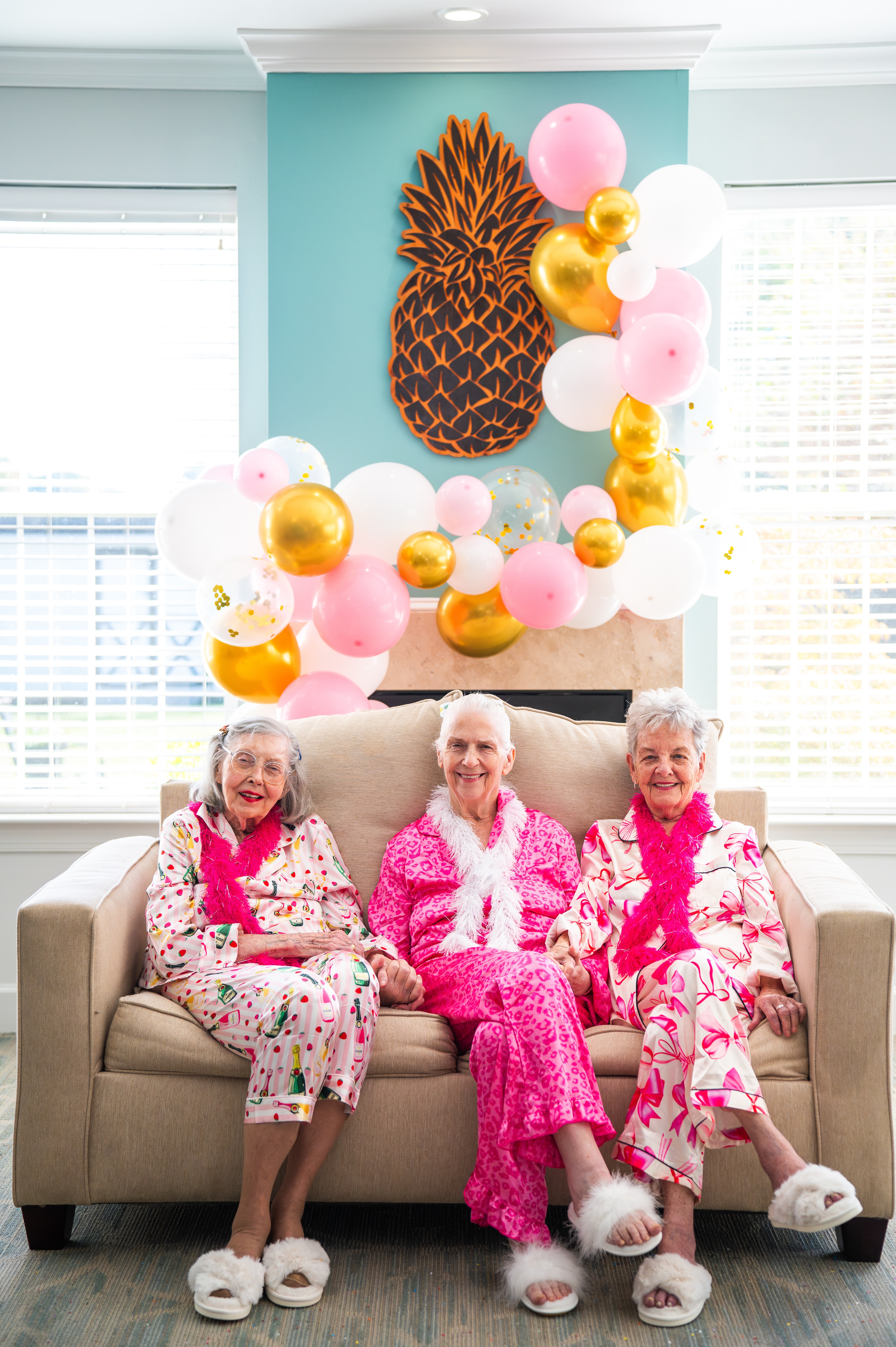A group of women sitting on a couch