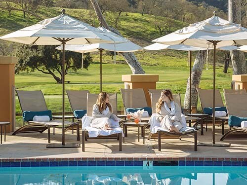 Swimming pool and sunbath at CordeValle, CA 95046, USA