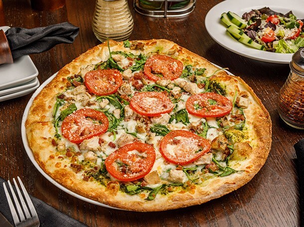 enjoy pizza with Waterstone Pizza